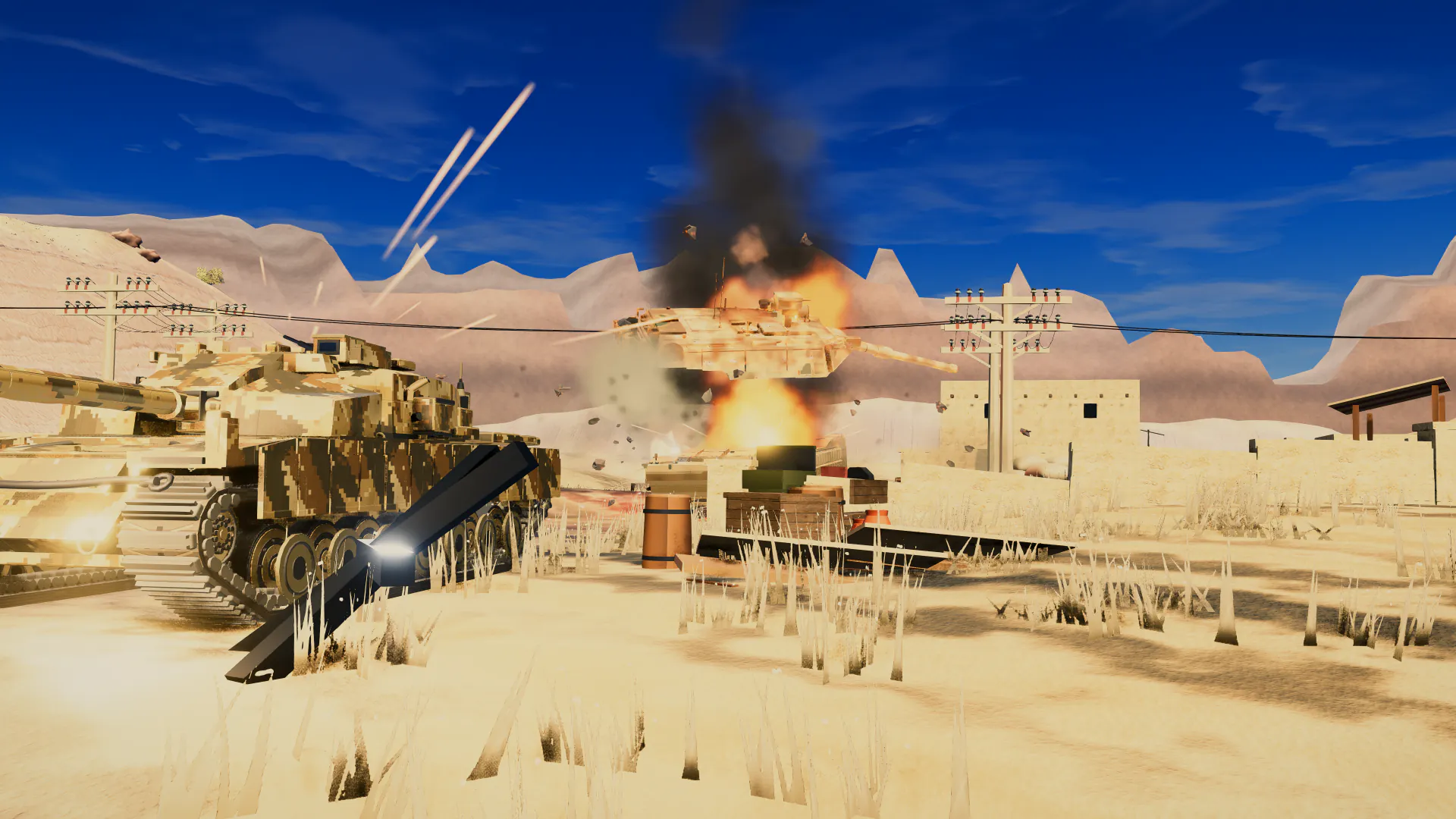 Tanks fighting through a desert wadi